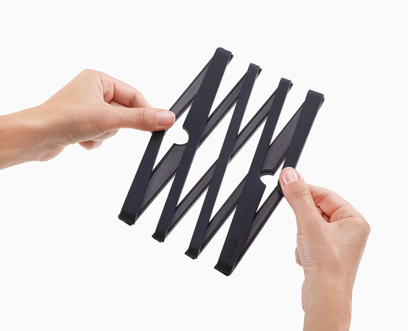 Dessous de Plat Design et Extensible en Noir Stretch™