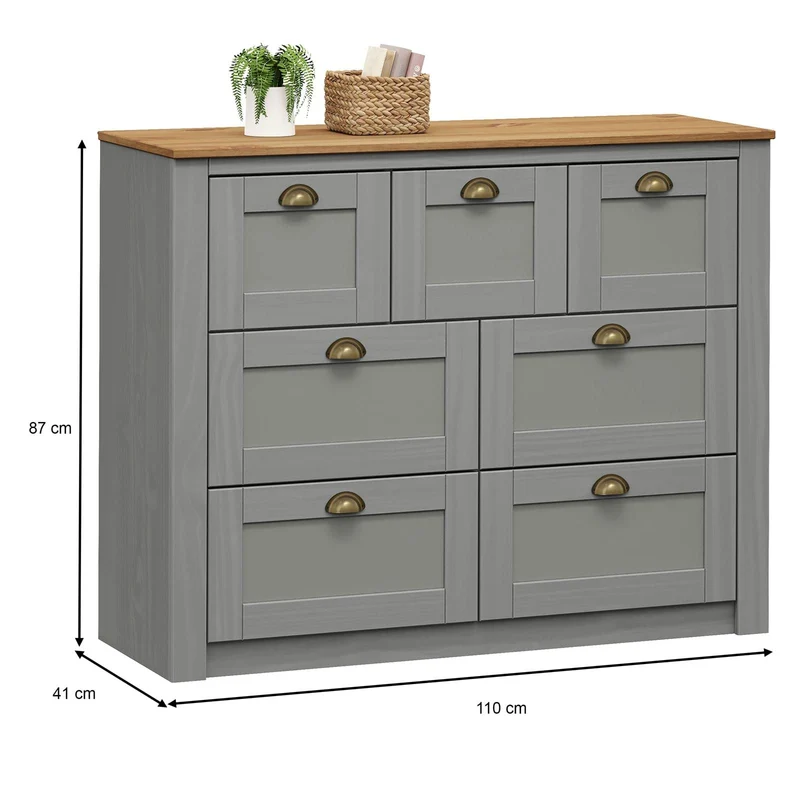 IDIMEX Commode Chambre Bolton L 110 cm en Bois Massif Gris et Brun 7 tiroirs Meuble de Rangement Adulte Buffet Pratique Style Campagne Classique avec Poignets Coquille en métal Coloris Bronze