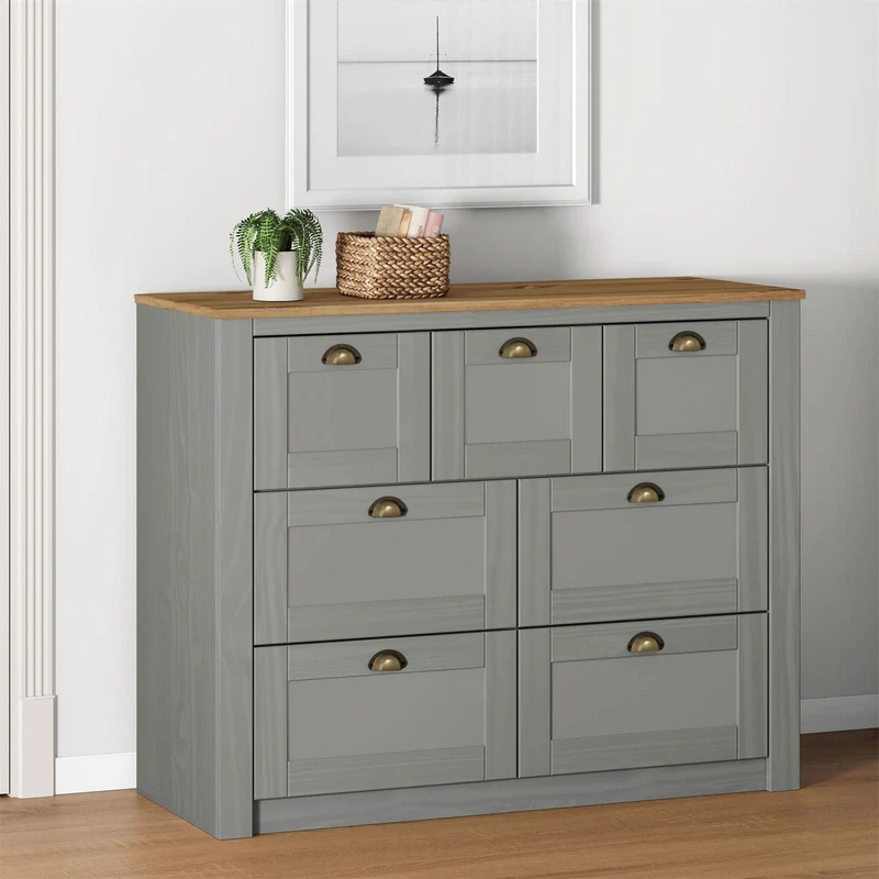 IDIMEX Commode Chambre Bolton L 110 cm en Bois Massif Gris et Brun 7 tiroirs Meuble de Rangement Adulte Buffet Pratique Style Campagne Classique avec Poignets Coquille en métal Coloris Bronze
