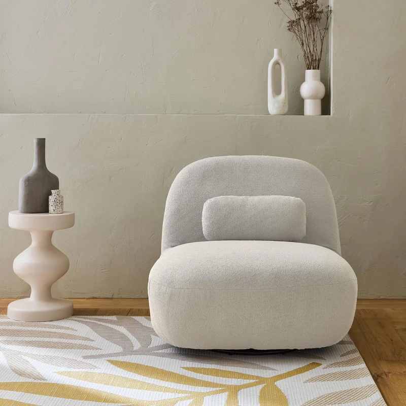 sweeek - Fauteuil pivotant 360° en Bouclette texturée Blanc crème. piètement en métal Noir Mat - Spino