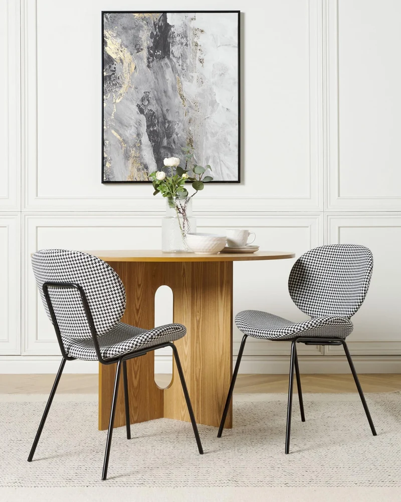 Beliani Lot de 2 Chaises de Salle à Manger Design Rétro sans Accoudoirs en Polyester Noir et Blanc Luana