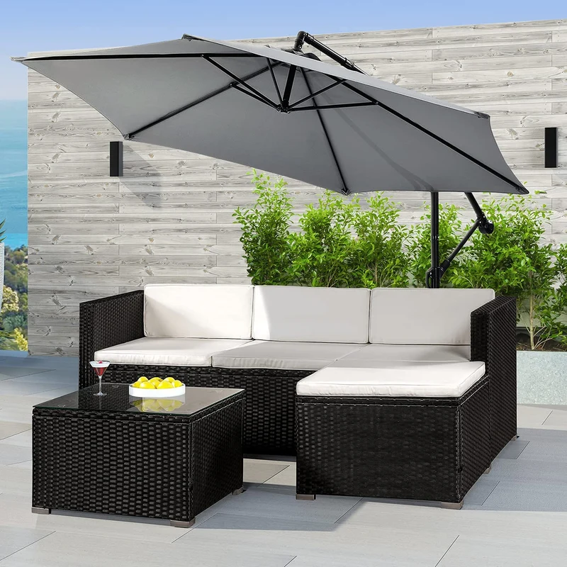 Juskys Salon de Jardin en polyrotin Lounge Punta Cana M, résistant aux intempéries - avec canapé 3 Places, Tabouret, Table & Coussins 3-4 Personnes Ensemble de Meubles de Jardin Noir/crème