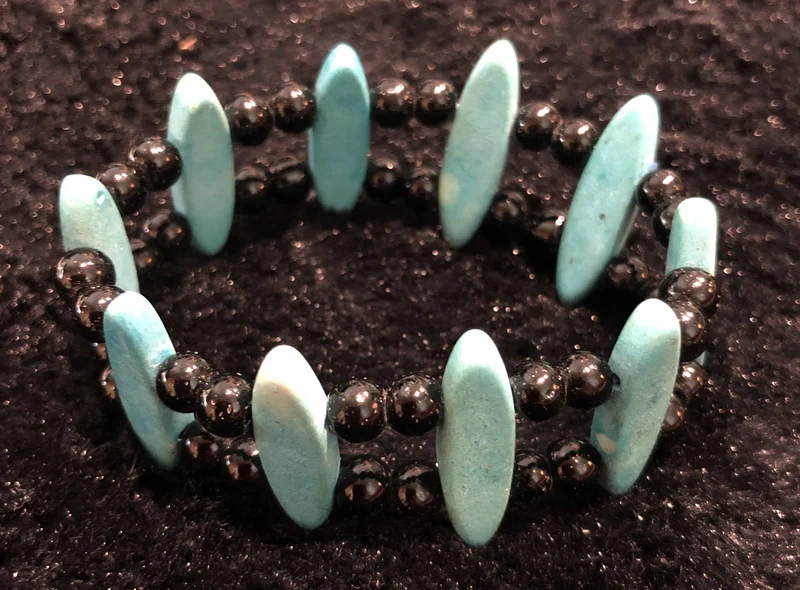 Turquoise Color and Black Bead Stretch Bracelet