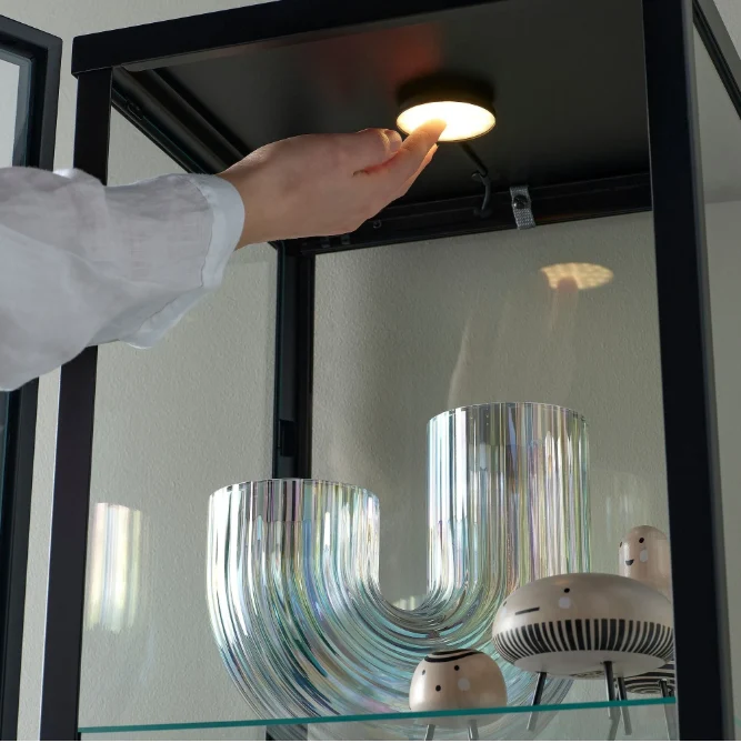 BLÅLIDEN Glass-door cabinet, black,35x32x151 cm/STRIMSÄV spotlight with LED, black, 6x1 cm