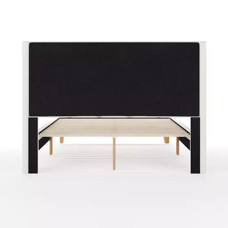 Lit plateforme rembourré avec tête de lit capitonnée à oreilles et longerons latéraux matelassés