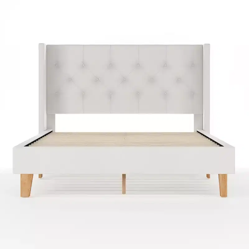 Lit plateforme rembourré avec tête de lit capitonnée à oreilles et longerons latéraux matelassés