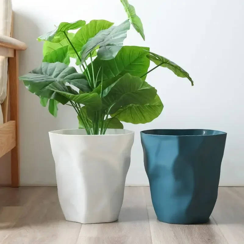 Poubelle ronde design irrégulier en plastique