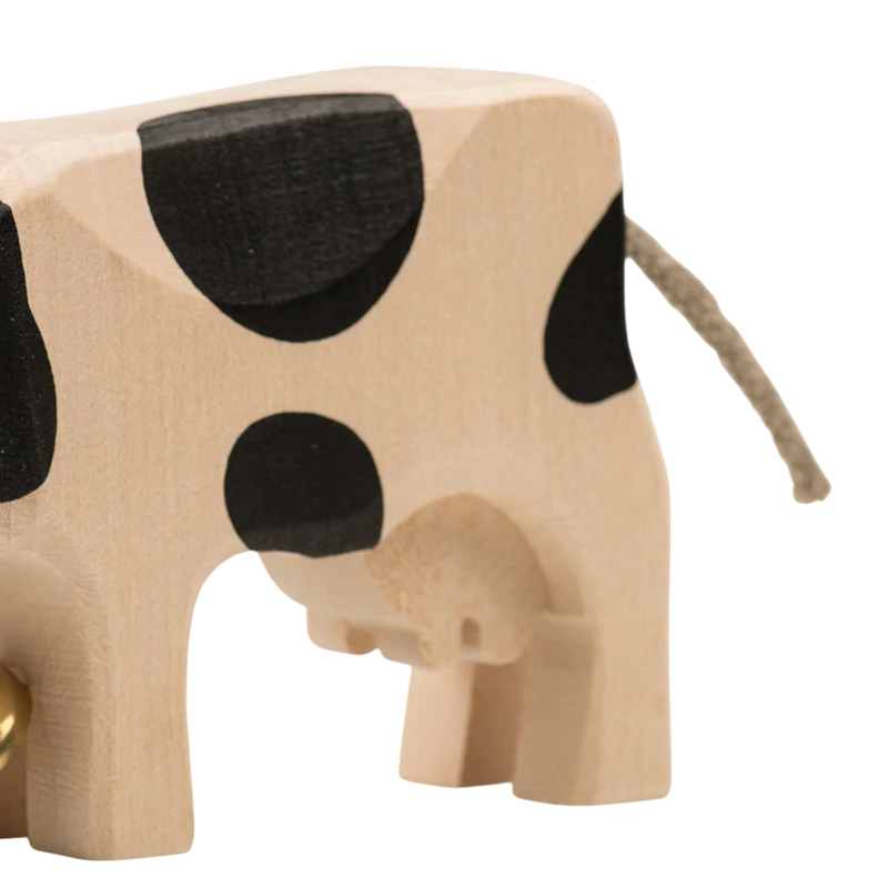 Trauffer Kuh 2 fressend Freiburger Holztier